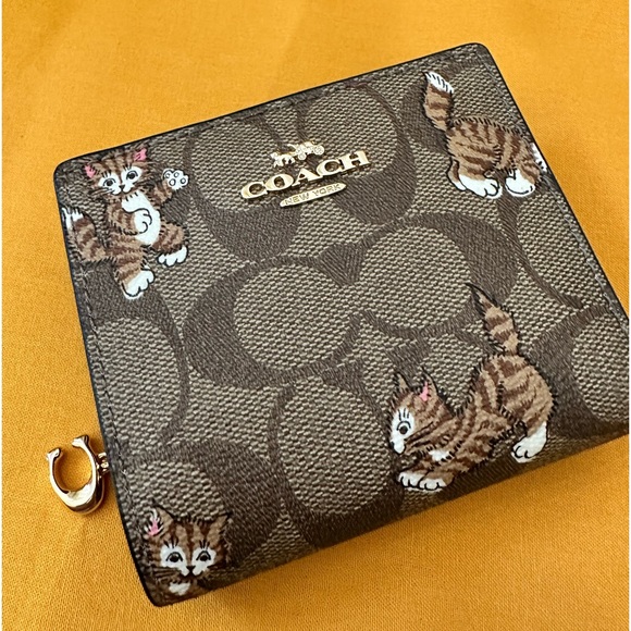 Coach Handbags - NWT Coach Snap Wallet In Signature Canvas With Dancing Kitten Print